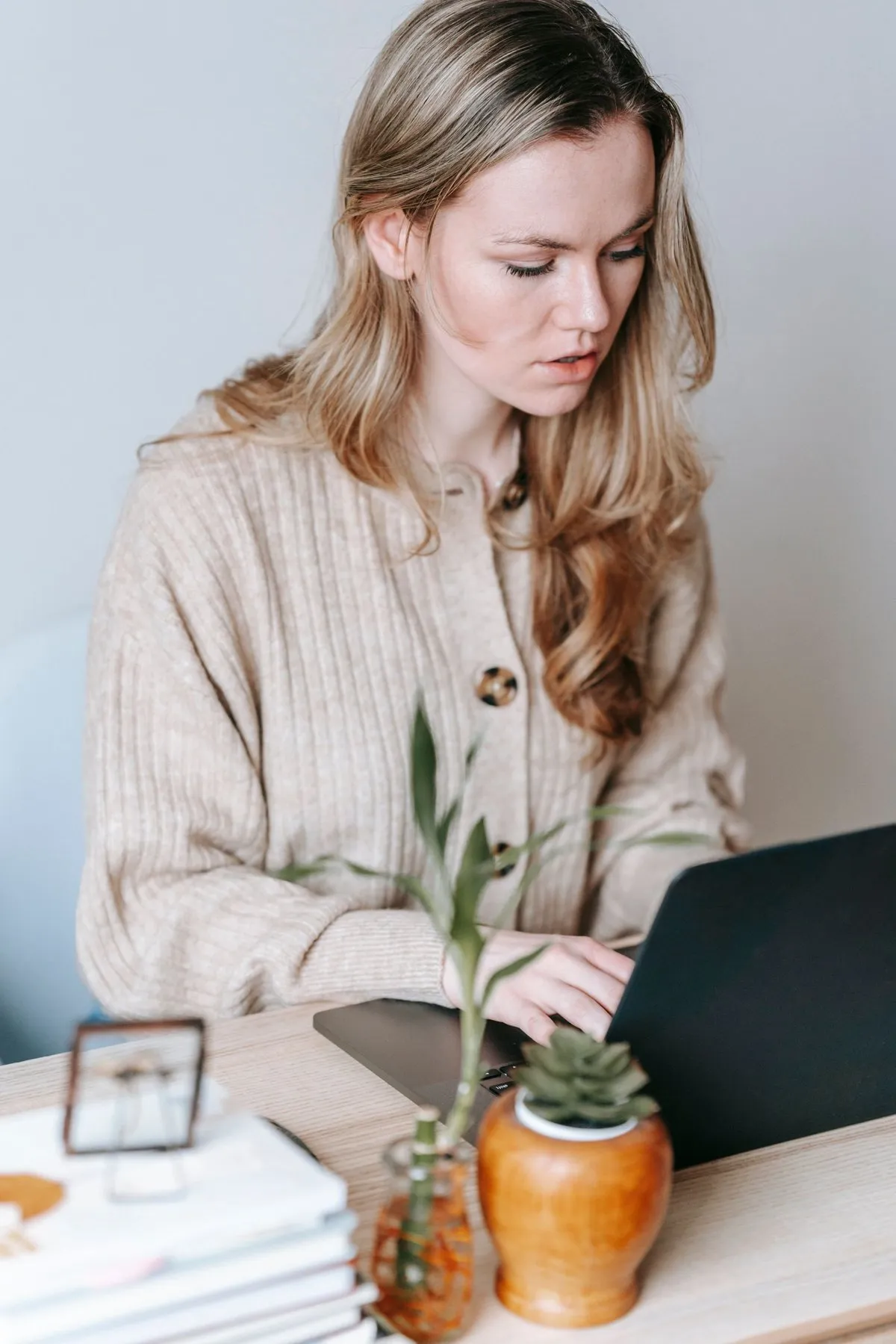 Professional working on a laptop in natural light